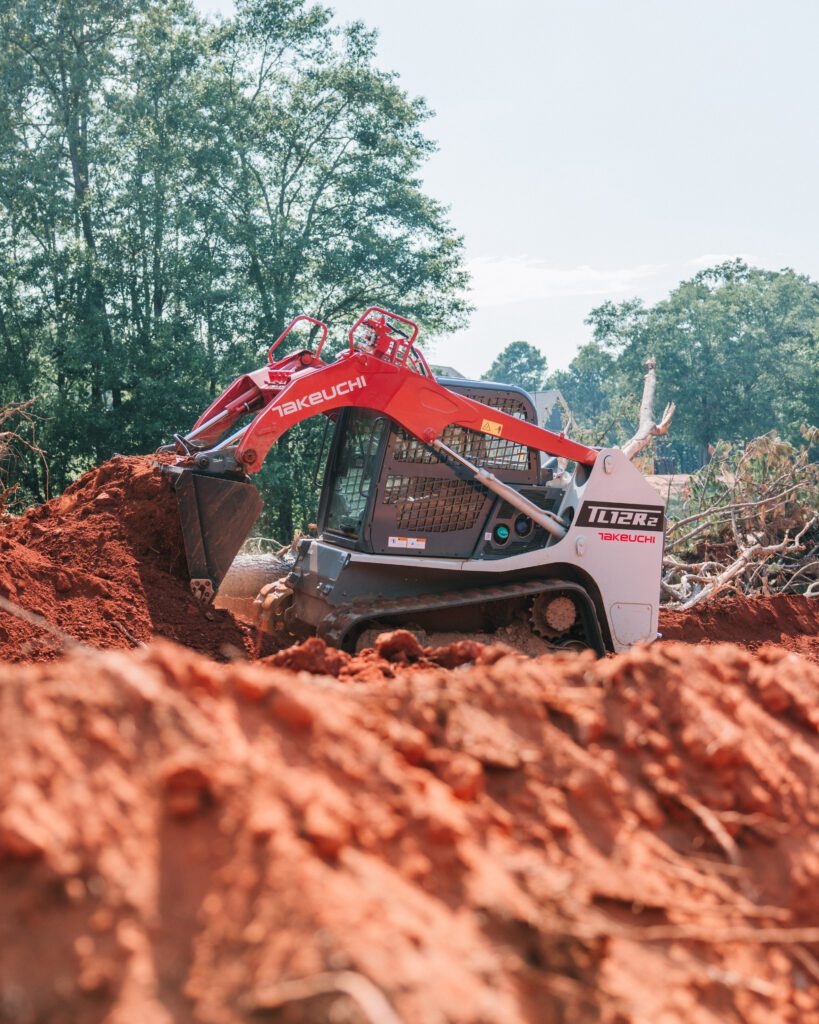 Takeuchi TL12R2 schranklader met zand