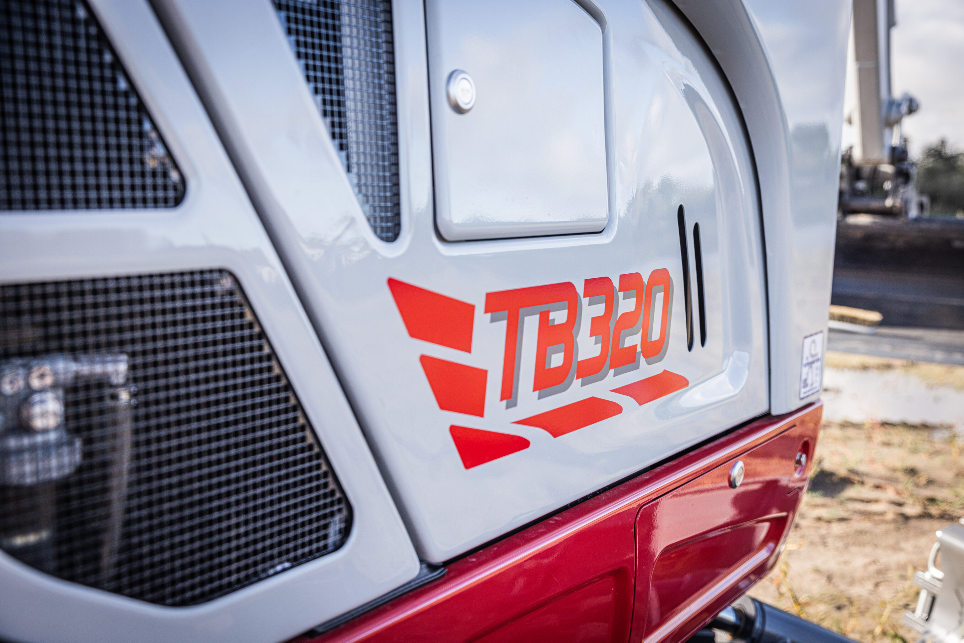 Takeuchi TB320 minigraver logo