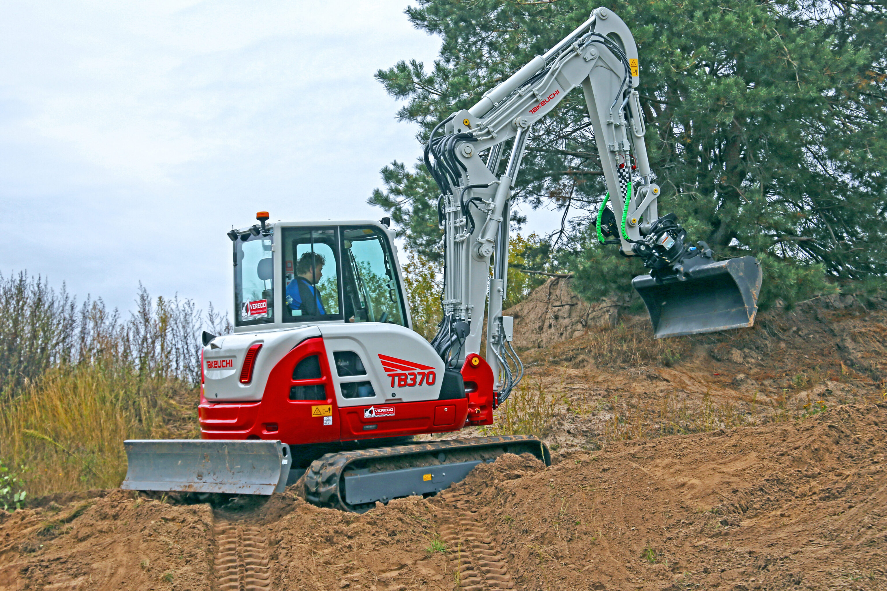 Takeuchi TB370 Two Piece Boom op zandhoop
