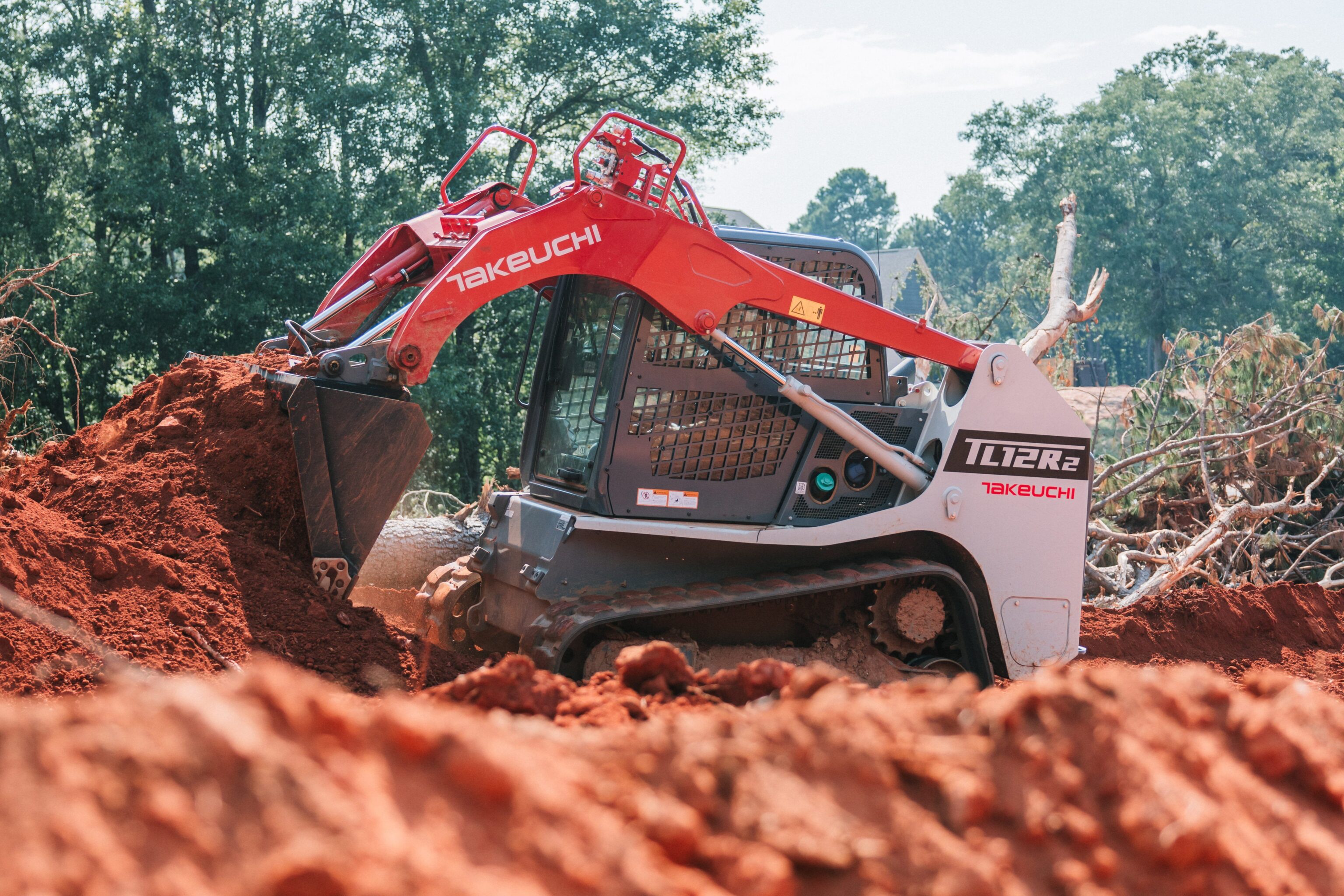 Takeuchi TL12R2 dumpt zand