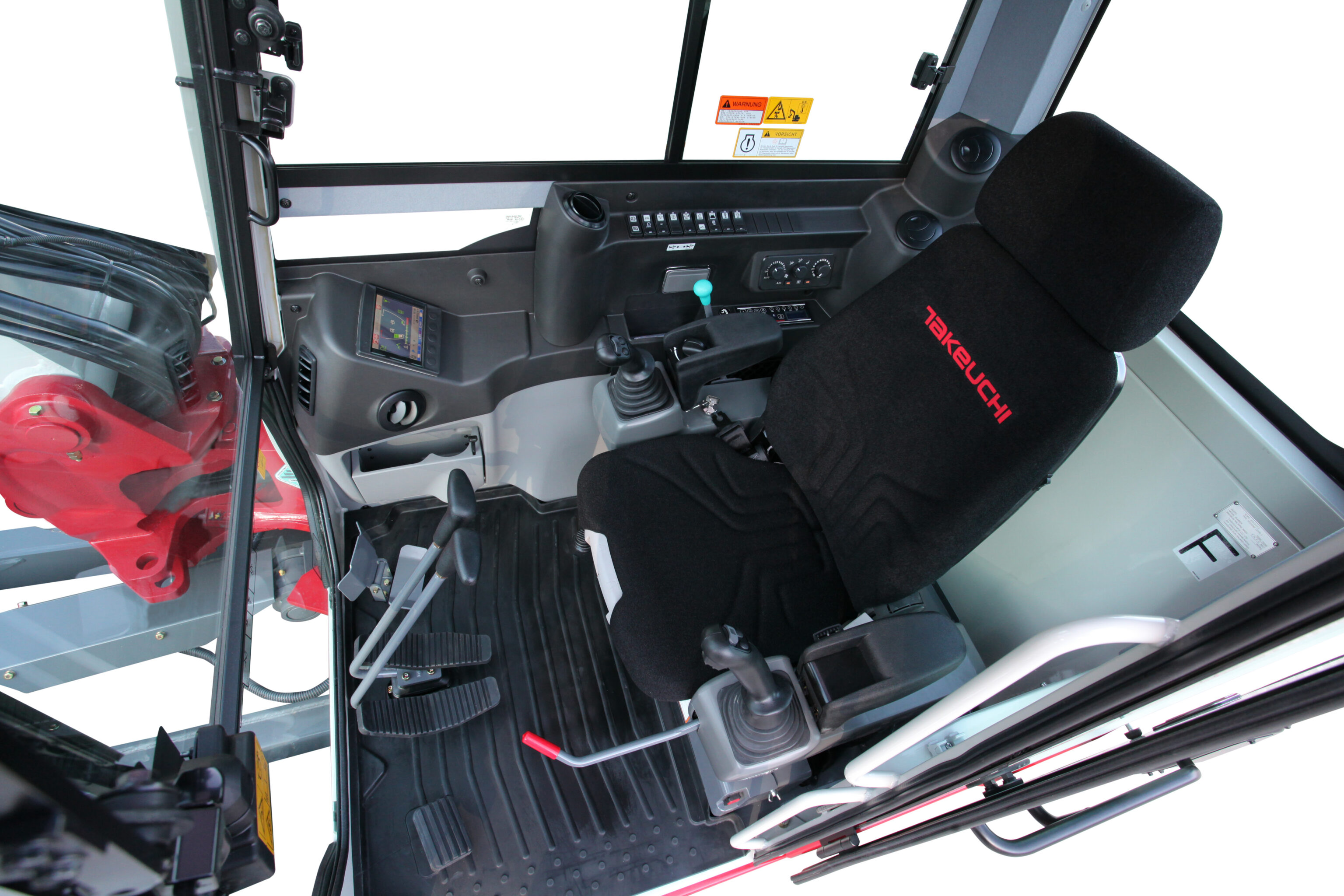 De ruime comfortabele cabine interieur van een Takeuchi TB290-2 graafmachine